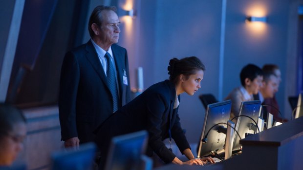 Tommy Lee Jones and Alicia Vikander as CIA bosses caught in their own power struggle. 