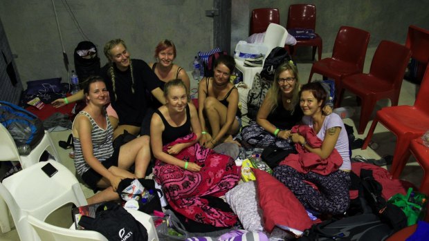 Backpackers at the Ayr Cyclone Shelter brace for Cyclone Debbie's arrival.
