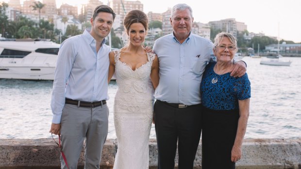 Peter Low (second from right) was killed in an explosion in an industrial accident at Harkaway on Monday. He is pictured at his daughter's wedding two weeks ago with his son Rien (far left) daughter Brooke and wife Jenny.