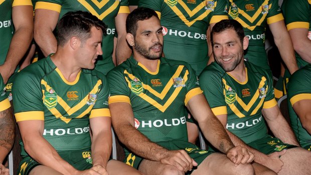 Reunion: Former Storm star Greg Inglis is surrounded by his old clubmates Cooper Cronk and Cameron Smith at the Kangaroos' team photo.