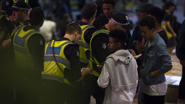 Police out in force on Sunday night, after Saturday's riot.