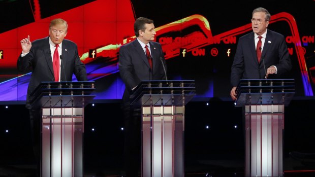 Donald Trump, left, and Jeb Bush, right, both speak as Ted Cruz looks on during the debate.