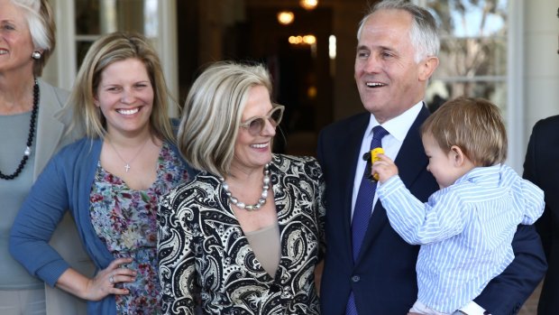 Mr Turnbull at Government House with his daughter Daisy, wife Lucy and grandson Jack.
