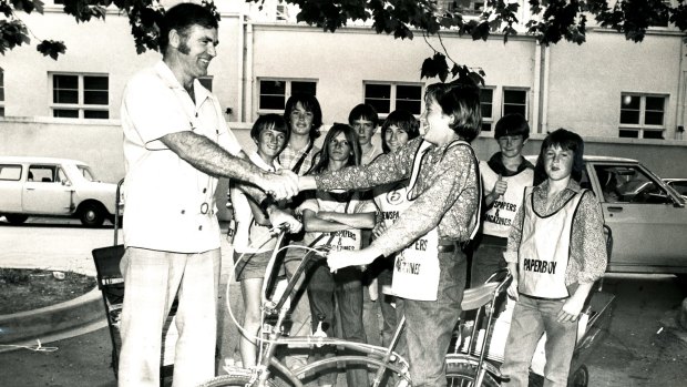 Presentation of a bike to the top paper boy at Johnstone's newsagents in Northbourne Ave City in 1974.