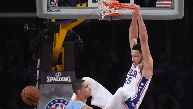 Hang time: Simmons slam dunks for Philadelphia against the LA Lakers