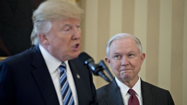 Jeff Sessions, US attorney general, right, with President Donald Trump.