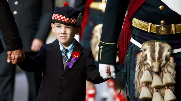 Marcus Cirillo, 5, attends the funeral procession for his father, Corporal Nathan Cirillo in Hamilton, Ontario.    