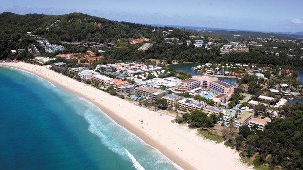 Authorities are still searching for a man seen swimming into the ocean from Noosa's Main Beach after midnight on Saturday morning.
