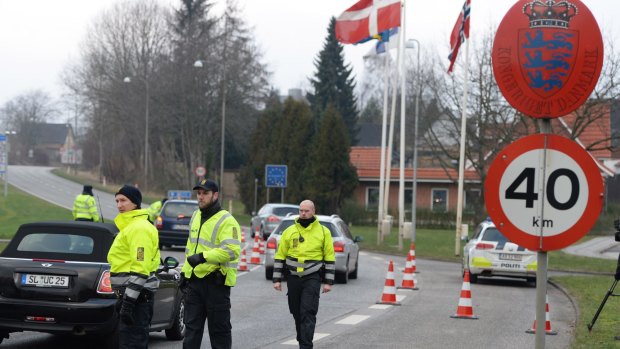 Danish police patrol Denmark's border with Germany on Monday.
