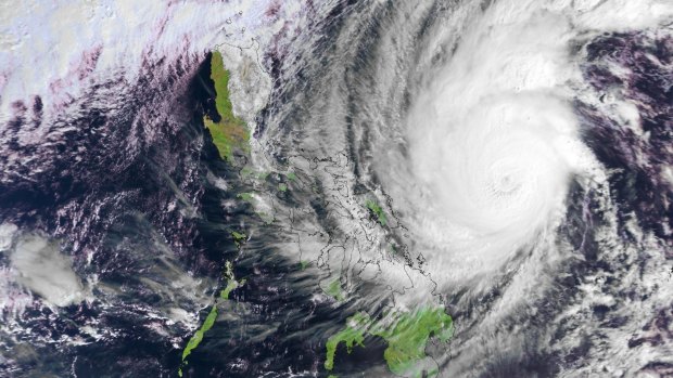 A satellite image of Typhoon Hagupit in the western Pacific Ocean.