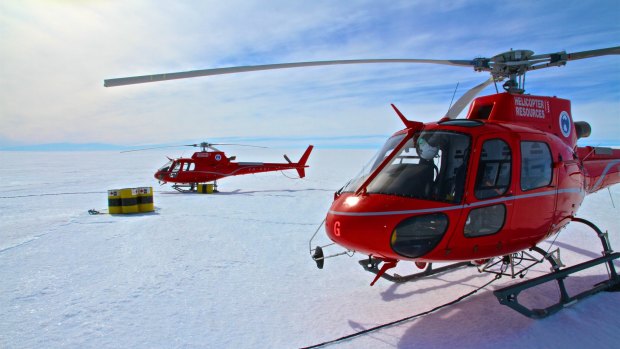 A photograph by David Wood of his and Paul Sutton's helicopters at the western ice shelf fuel cache on December 28, 2015.