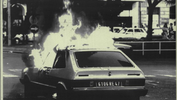 A French licensed car burns in the street after it was set ablaze in San Sebastian in 1987. Police believed it to be the work of ETA.