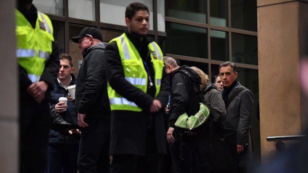 Security guards outside the court ahead of Cardinal Pell's appearance.