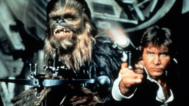 The terrier-like Chewbacca (Peter Mayhew) and Han Solo (Harrison Ford) (right).