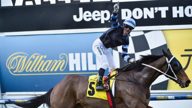 All the way: Noel Callow celebrates aboard The Cleaner at Moonee Valley on Saturday.
