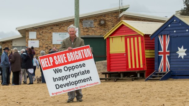 Resident and local historian Weston Bate in front of the existing Brighton Lifesaving Club on Sunday. 