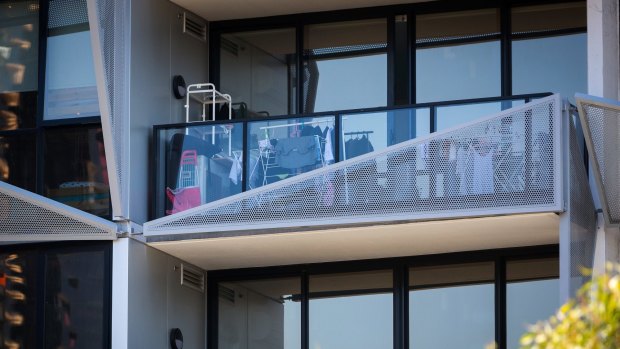 A cluttered balcony of the Lacrosse tower at 673 La Trobe Street, as photographed in January. 