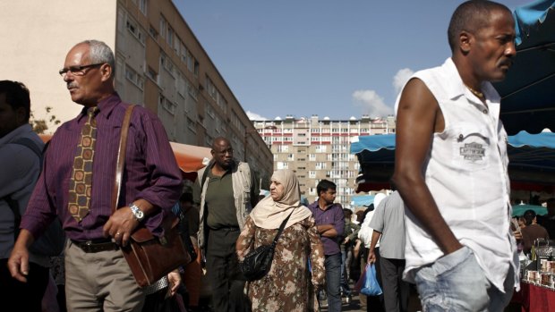 A weekly market in the multicultural Bondy suburb of Paris, where beneath the surface tensions are bubbling.