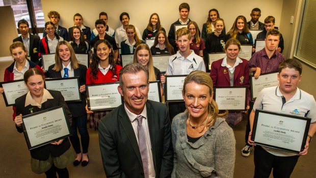 Olympians Shaun Creighton and Louise Dobson present Canberra Secondary School students with their 2016 Pierre de Coubertin Awards.