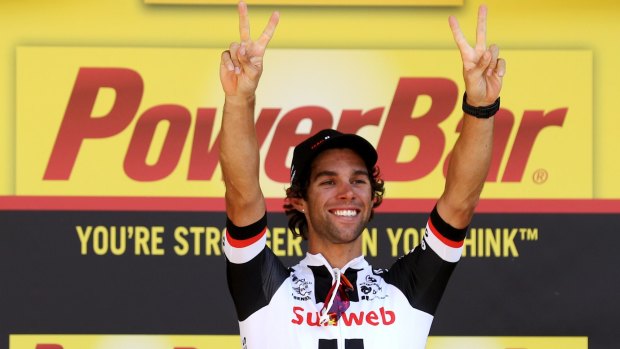 Michael Matthews riding for Team Sunweb celebrates on the podium after winning stage 16 of the 2017 Le Tour de France.