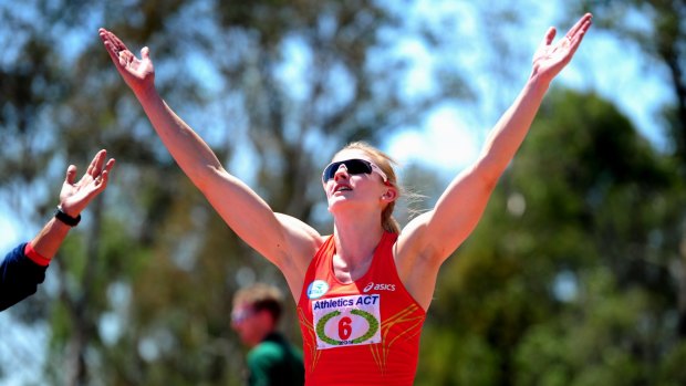 Melissa Breen celebrates breaking the Australian women's 100m record.