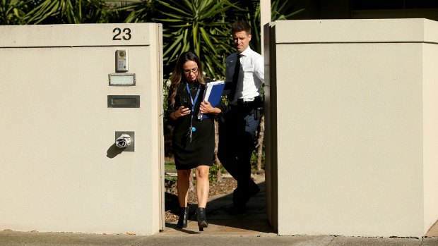 Police leave the RIstevski family home in February after the discovery of Karen Ristevski's body.