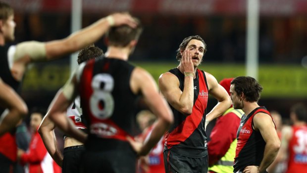 Hard to swallow: Joe Daniher of the Bombers looks dejected after the siren.