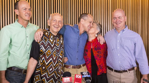 Mike Greste (right) and his family welcome home freed Australian journalist Peter Greste (centre).