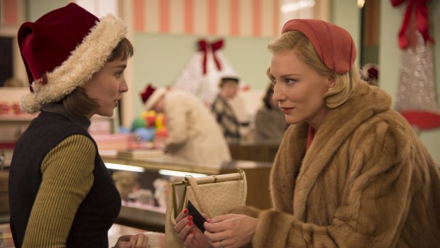 Rooney Mara, left, as Therese Belivet, and Cate Blanchett, as Carol Aird, in a scene from the lesbian romance drama, <i>Carol</i>. 
