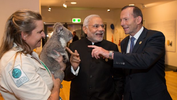 Indian Prime Minister Narendra Modi (pictured meeting a koala with Tony Abbott) will hold talks with Queensland Premier Campbell Newman on Sunday.