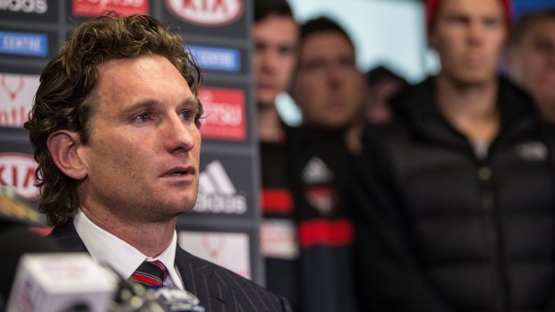 James Hird sheds a tear during his press conference.
