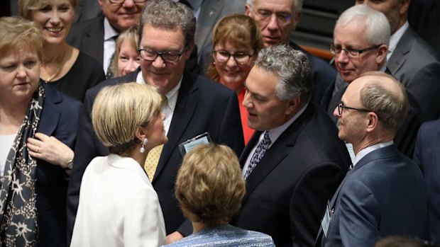 Ms Bishop greets ambassadors Joe Hockey and Alexander Downer before they pose for photos with other global heads of mission.