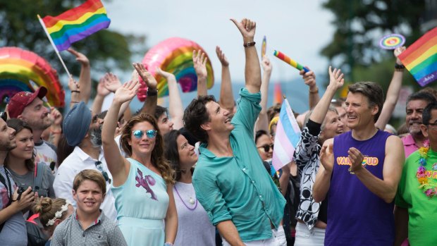Canadian Prime Minister Justin Trudeau with his wife Sophie Gregoire Trudeau, centre left, and their children Hadrien, Ella-Grace and Xavier, next to his mother, take part in the 2016 Pride Parade in Vancouver. 