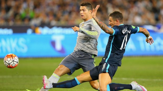 Too quick: Cristiano Ronaldo of Real Madrid scores a goal infront of Aleksandar Kolarov of Manchester City.