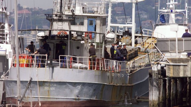 Australian authorities dock the freight ship Uniana alongside the HMAS Platypus Naval Base in Sydney on October 15, 1998.  