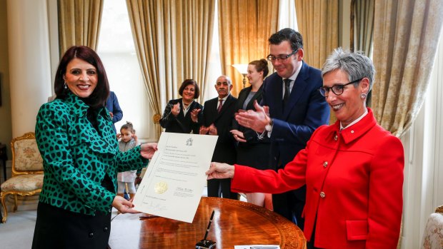 Minister for Consumer Affairs Marlene Kairouz (left) sworn in by Victorian Governor Linda Dessau AM in 2016.