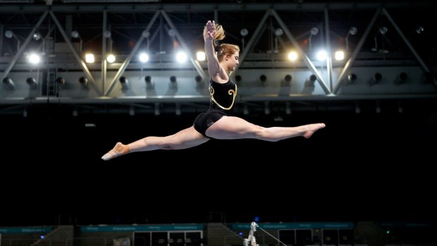 Gymnast Lauren Mitchell soars at training ahead of the Australian Gymnastics Championships at Hisense Arena, starting Wednesday.