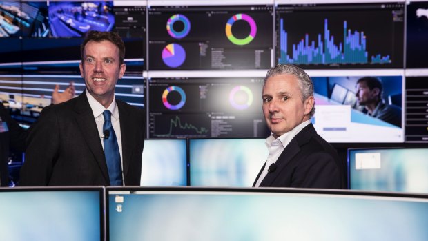 Dan Tehan, Minister Assisting the Prime Minister for Cyber Security and Telstra chief executive Andrew Penn at the opening of Telstra's first Security Operation Centre in Sydney last year.