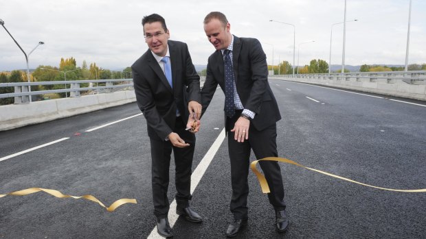 ACT senator Zed Seselja and Chief Minister Andrew Barr open the Majura Parkway last year. It has boosted Canberra's productivity by diverting thousands of trucks away from the CBD.