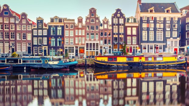 Advertising campaigns focus on the city's famous canals and art museums but locals say the city's free-wheeling and edgy spirit has been killed off as expats flood in.