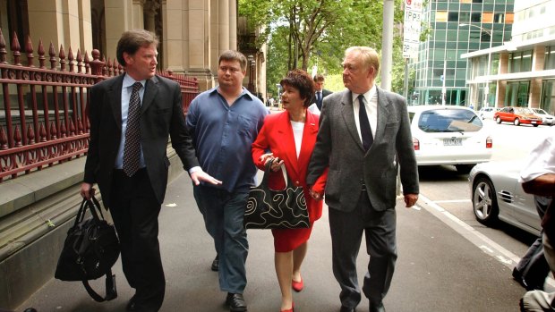 Rob Stary (left) talks to the brother and parents of Joseph “Jihad Jack” Thomas outside Melbourne Supreme Court in December 2004.