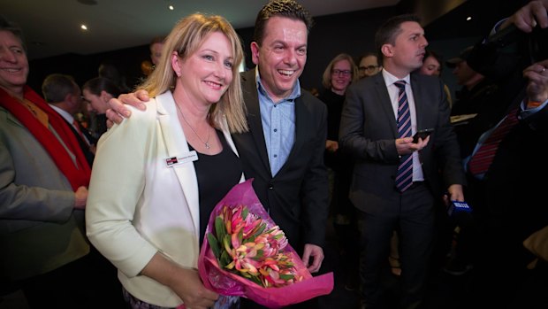 Nick Xenophon celebrates with Rebekha Sharkie on Saturday night. 