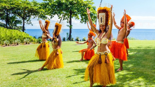 Polynesian women perform traditional dance in Papeete, French Polynesia.