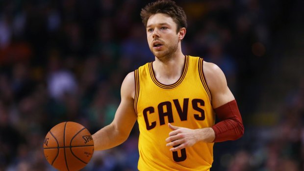 Paying his dues: Matthew Dellavedova takes the ball up the court for the Cleveland Cavaliers.