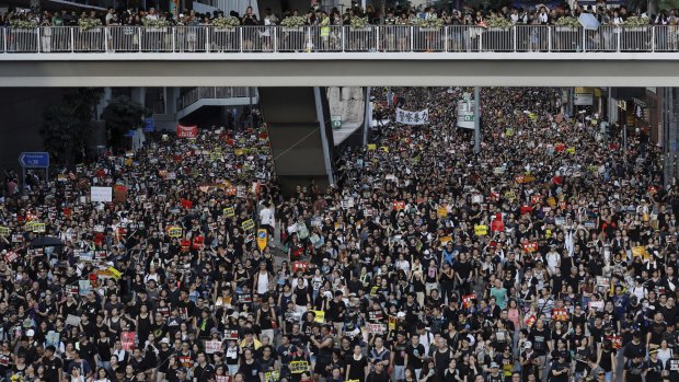 Protesters take part in a rally on Monday, July 1, 2019, in Hong Kong. Travellers are advised to avoid the protests.
