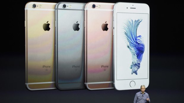 Apple chief executive Tim Cook unveils the iPhone 6s, in four colours.