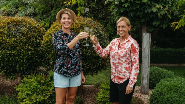 Rachel Davey (left) and partner Martina Sebova celebrate in Melbourne.