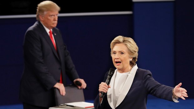Republican nominee Donald Trump glares at his Democrat opponent Hillary Clinton during the second presidential debate.