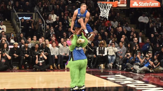 Mascot manoeuvres: Orlando Magic forward Aaron Gordon defies gravity in Toronto.