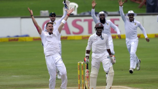 Dale Steyn celebrates after getting the wicket of West Indies veteran Shivnarine Chanderpaul.